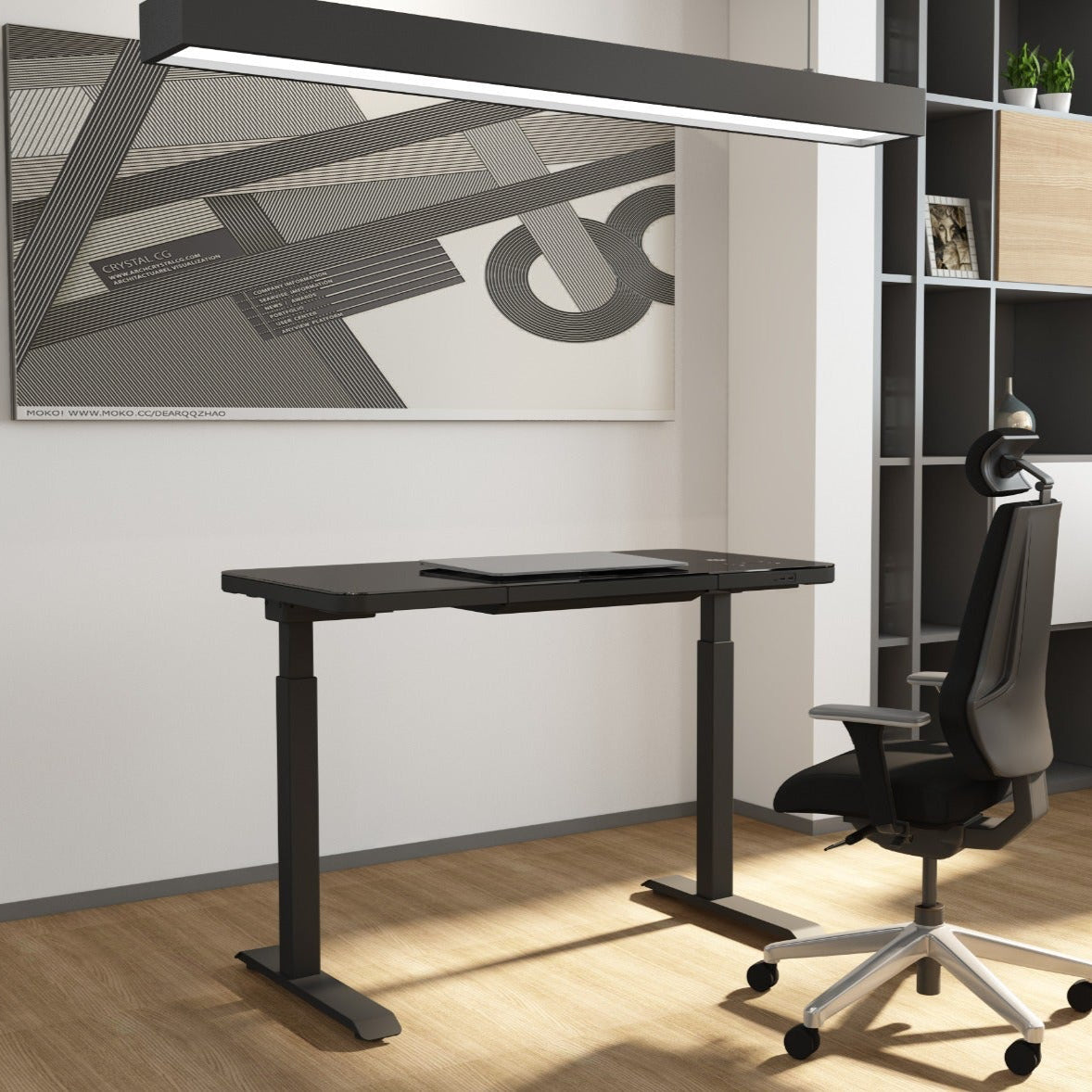 Modern office setup with a black adjustable desk and chair, framed artwork on the wall.